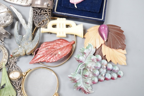 A 19th century 800 white metal heart shaped box, 63mm and a small grouop of other white metal items and costume jewellery.